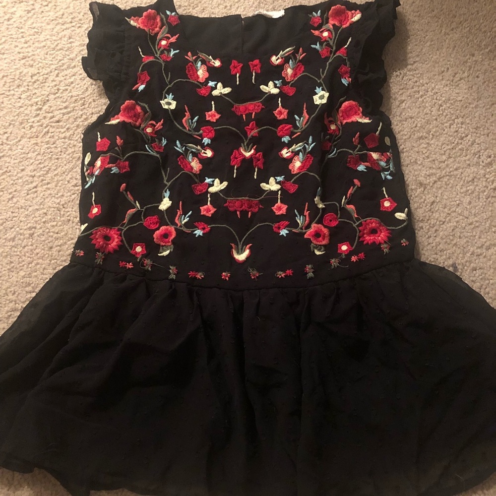 Black shirt with floral embroidered top